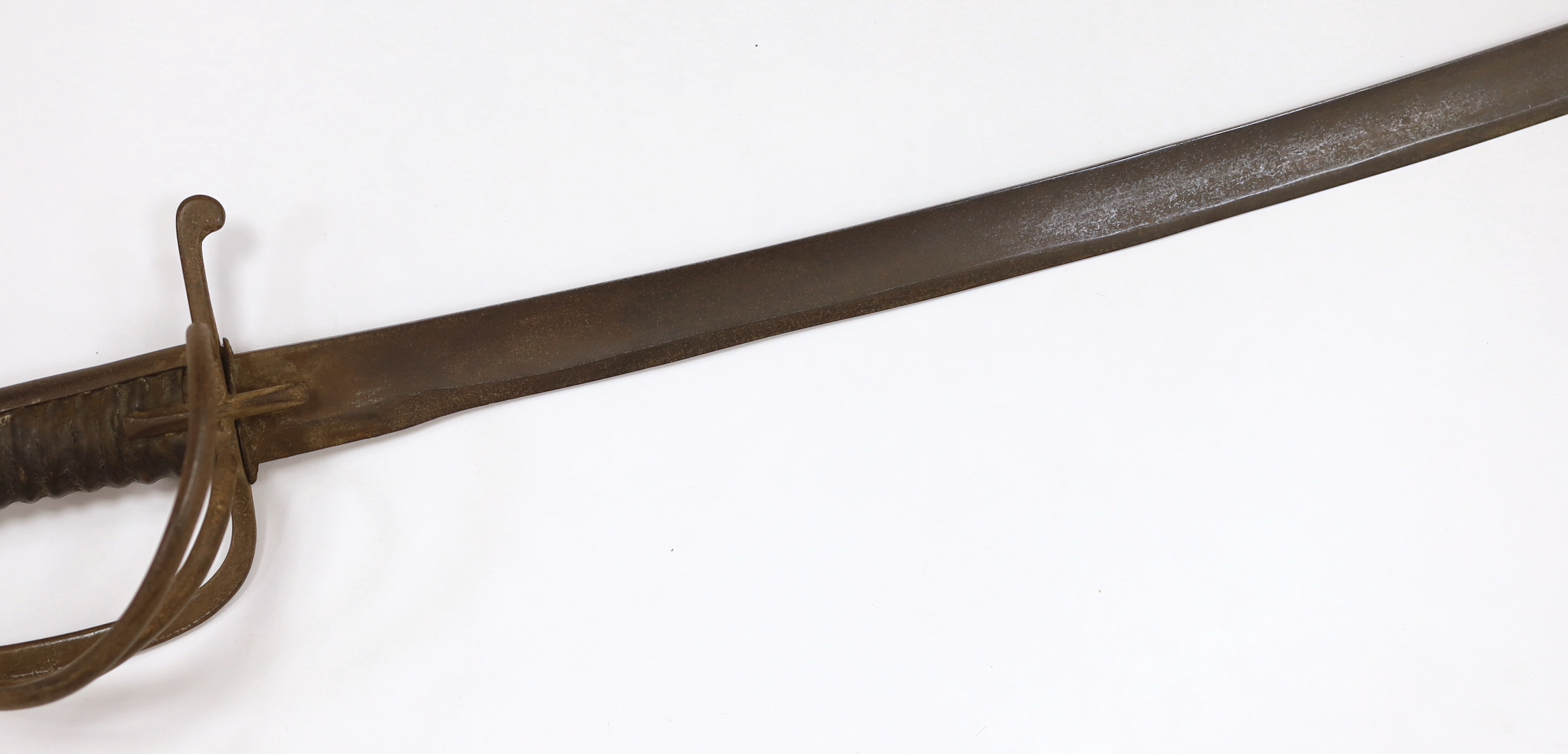 A military sabre with wrought iron guard stamped 377, blade 89cm